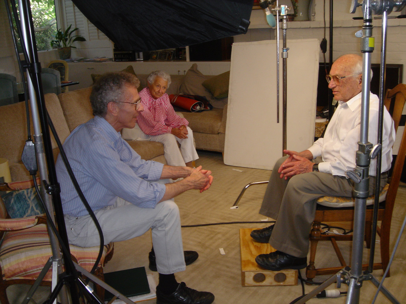 Between scenes during filming of The Power of Choice, Bob chats with Milton and Rose Friedman.